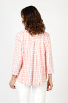 Cali Girls Betty Check Embroidered Blouse in Coral/white.  Gingham check with contrast color embroidery.  Pointed collar button down blouse with hidden button placket.  3/4 sleeve with fold back cuff and button detail.  Green zipper detail above left breast.  Back yoke with ring tab and inverted back pleat.  Relaxed fit._t_59841889403246