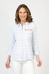 Cali Girls Betty Check Embroidered Blouse in Light Blue/white.  Gingham check with contrast color embroidery.  Pointed collar button down blouse with hidden button placket.  3/4 sleeve with fold back cuff and button detail.  Coral zipper detail above left breast.  Back yoke with ring tab and inverted back pleat.  Relaxed fit._t_59841889272174