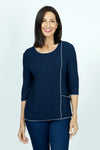 Top Ligne Texture Knit Stitch Pocket Top in Navy.  Crew neck 3/4 sleeve top in lightweight puckered fabric.  Off center front seaming with white top stitching and hidden front pocket.  Plain back.  White stitch trim at neck, hem and cuff. Relaxed fit._t_59584341246318