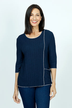 Top Ligne Texture Knit Stitch Pocket Top in Navy.  Crew neck 3/4 sleeve top in lightweight puckered fabric.  Off center front seaming with white top stitching and hidden front pocket.  Plain back.  White stitch trim at neck, hem and cuff. Relaxed fit._59584341246318