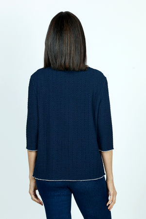 Top Ligne Texture Knit Stitch Pocket Top in Navy.  Crew neck 3/4 sleeve top in lightweight puckered fabric.  Off center front seaming with white top stitching and hidden front pocket.  Plain back.  White stitch trim at neck, hem and cuff. Relaxed fit._59584341377390