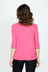 Top Ligne Texture Knit Stitch Pocket Top in Pink.  Crew neck 3/4 sleeve top in lightweight puckered fabric.  Off center front seaming with black top stitching and hidden front pocket.  Plain back.  Black stitch trim at neck, hem and cuff. Relaxed fit._t_59584339247470