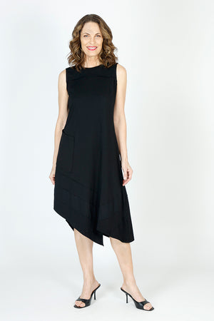 Top Ligne Asymmetric Sleeveless Dress in Black.  Crew neck sleeveless dress with front yoke.  Diagonal contour seaming in front and back with diagonal pieced tiers below hip on 1 side.  Single front patch pocket.  Asymmetrical hem.  Relaxed fit._59699402932590