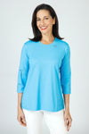 Lolo Luxe Laser Cut Flower Tee in bright Blue.  Crew neck 3/4 sleeve tee.  Laser cut small flowers scattered on front and sleeves.  Laser cut small circles around neckline. Plain back Relaxed fit._t_59622839615854