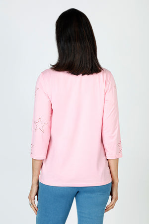 Lolo Luxe Laser Cut Flower Tee in Pink.  Crew neck 3/4 sleeve tee.  Laser cut small flowers scattered on front and sleeves.  Laser cut small circles around neckline. Plain back Relaxed fit._59622839550318