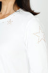 Lolo Luxe Laser Cut Flower Tee in White.  Crew neck 3/4 sleeve tee.  Laser cut small flowers scattered on front and sleeves.  Laser cut small circles around neckline. Plain back Relaxed fit._t_59622839452014