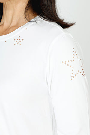 Lolo Luxe Laser Cut Flower Tee in White.  Crew neck 3/4 sleeve tee.  Laser cut small flowers scattered on front and sleeves.  Laser cut small circles around neckline. Plain back Relaxed fit._59622839452014