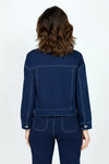 Lolo Luxe Jean Terry Shortie Jacket in Denim.  Pointed collar button front cropped jacket with long sleeves and grommet button cuffs.  Front patch flap pockets with grommet button flap.  Banded hem.  Contour seaming in back.  Contrast color top stitching.  Relaxed fit._t_59584114098542