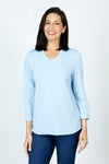 Top Ligne Ribbed V Neck Shirttail Top in Light Blue.  Raised vertical rib.  V neck with 3/4 sleeve with shirttail hem.  Relaxed fit._t_59595263443310