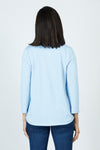 Top Ligne Ribbed V Neck Shirttail Top in Light Blue.  Raised vertical rib.  V neck with 3/4 sleeve with shirttail hem.  Relaxed fit._t_59595262099822