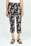 Holland Ave Susan Daisy Fun Crop Pant.  Pink and red daisies on a black background.  No waistband pull on pant with faux zipper placket.  Snug through stomach and thigh, falls straight to hem.  Side leg slits.  Inseam: 24"_t_52987900330350