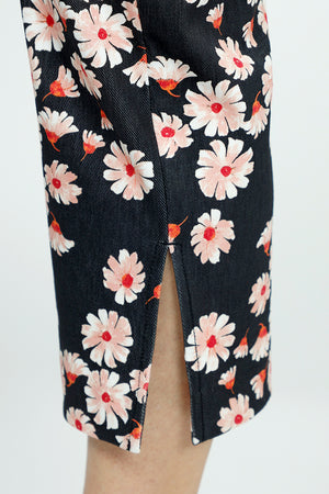 Holland Ave Susan Daisy Fun Crop Pant.  Pink and red daisies on a black background.  No waistband pull on pant with faux zipper placket.  Snug through stomach and thigh, falls straight to hem.  Side leg slits.  Inseam: 24"_52987900494190