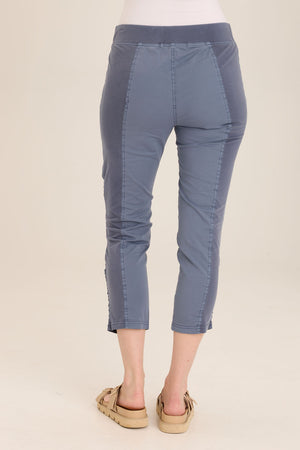 Wearables Geyser Crop in Hypnotic, a medium blue.  Pull on pant with jersey waist.  Poplin body.  Front slash pockets.  Ruched detail down center leg.  Jersey insets on side leg.24 1/2" inseam._59797428601198