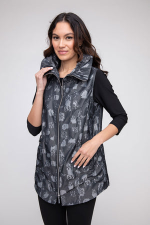 LIV by Habitat Sculpt Toggle Vest in Black.  Light gray splash print on black.  Zip front with wired convertible collar sleeveless vest.  Contour seaming.  2 front pockets with cinch toggle detail.  Back center seam.  Curved high low hem. Relaxed fit._52923686224238