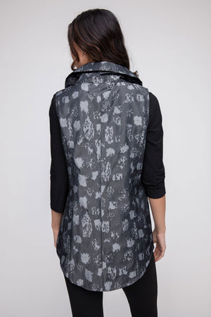 LIV by Habitat Sculpt Toggle Vest in Black.  Light gray splash print on black.  Zip front with wired convertible collar sleeveless vest.  Contour seaming.  2 front pockets with cinch toggle detail.  Back center seam.  Curved high low hem. Relaxed fit._52923686257006