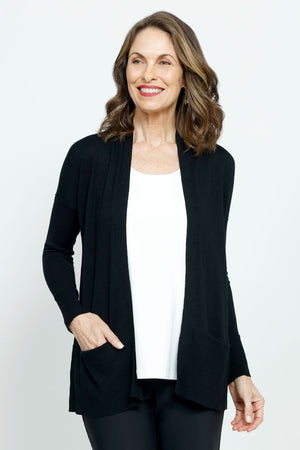 Metric Open Cardigan in Black. Long cardigan with open front and long sleeves. 2 front pockets. Deep rib trim at hem and cuff. Classic fit._36312568037576