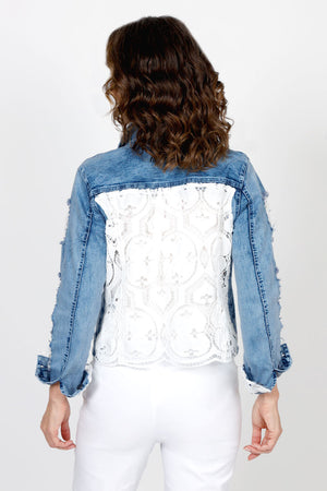 Frederique Lace Back Denim Jacket in Denim. Jean jacket styling. Solid denim front, sleeves and back yoke. Lace back with scallop edge. Lace trim lines cuff. Distressed patches on sleeves lined with lace. Classic fit._35563010621640