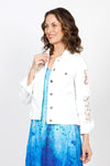 Frederique Lace Back Denim Jacket in White. Jean jacket styling. Solid white denim front, sleeves and back yoke. Lace back with scallop edge. Lace trim lines cuff. Distressed patches on sleeves lined with lace. Classic fit._t_35563010588872
