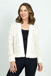 Metric Cardigan with Pearl Detail in Ivory.  Chunky open front cable knit with peal and iridescent stones.  Rib trim at hem and cuff.  Slightly cropped, boxy fit._t_52919131308398