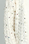 Metric Cardigan with Pearl Detail in Ivory.  Chunky open front cable knit with peal and iridescent stones.  Rib trim at hem and cuff.  Slightly cropped, boxy fit._t_52919131373934