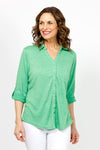 Top Ligne Roll Tab Button Down Top in Kelly Green. Pointed collar open v neck button down with 3/4 roll button tab sleeves. Curved hem. Lightly textured fabric. Relaxed fit._t_35439032598728