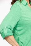 Top Ligne Roll Tab Button Down Top in Kelly Green. Pointed collar open v neck button down with 3/4 roll button tab sleeves. Curved hem. Lightly textured fabric. Relaxed fit._t_35439032697032
