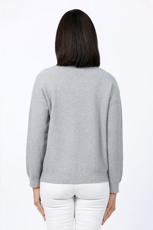 Ten oh 8 Heart Stitch Sweater in Gray.  Waffle knit crew neck sweater with long sleeves. Multi colored hand stitched heart outline on front.  Rib trim at neck hem and cuff.  Relaxed fit._52894026531182