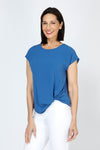 Top Ligne Airflow Twist Hem Top in Indigo.  Lightly textured crew neck cap sleeve top with twist hem on left side. Keyhole opening at back neck with button closure.  Relaxed fit._t_59759859433838