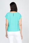 Top Ligne Airflow Twist Hem Top in Turquoise.  Lightly textured crew neck cap sleeve top with twist hem on left side. Keyhole opening at back neck with button closure.  Relaxed fit._t_59759859269998