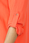 Top Ligne 2 Pocket Button Roll Tab Top in Coral.  Crew neck banded collar with notched v neck.  Button down.  2 breast patch pockets with button flap.  3/4 sleeve with button roll tab.  Gold buttons. Shoulder epaulets.  Shirttail hem.  Relaxed fit._t_59598820245870