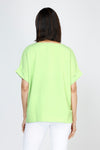 Top Ligne Airflow Dolman V Neck Top in Kiwi.  Lightly textured and airy top.  V neck with short cuffed dolman sleeves.  A line shape.  Relaxed fit._t_59764799766894