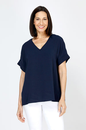 Top Ligne Airflow Dolman V Neck Top in Navy.  Lightly textured and airy top.  V neck with short cuffed dolman sleeves.  A line shape.  Relaxed fit._59764799799662