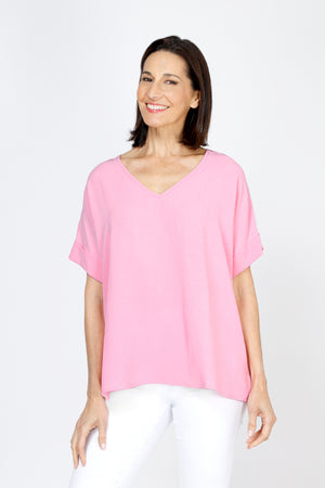 Top Ligne Airflow Dolman V Neck Top in Peony.  Lightly textured and airy top.  V neck with short cuffed dolman sleeves.  A line shape.  Relaxed fit._59764799996270