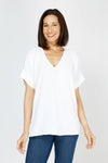 Top Ligne Airflow Dolman V Neck Top in White.  Lightly textured and airy top.  V neck with short cuffed dolman sleeves.  A line shape.  Relaxed fit._t_59764799734126