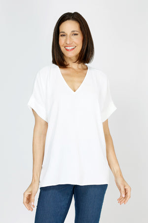 Top Ligne Airflow Dolman V Neck Top in White.  Lightly textured and airy top.  V neck with short cuffed dolman sleeves.  A line shape.  Relaxed fit._59764799734126