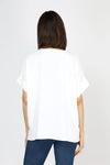 Top Ligne Airflow Dolman V Neck Top in White.  Lightly textured and airy top.  V neck with short cuffed dolman sleeves.  A line shape.  Relaxed fit._t_59764799963502