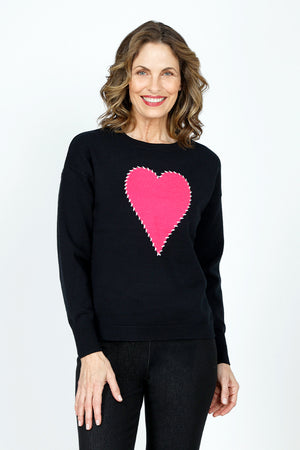 Ten Oh 8 Big Heart Outline Stitch Sweater in Black.  Crew neck drop shoulder long sleeve mid-weight knit.  Large hot pink heart on center front outlined in white blanket stitching.  Rib trim at neck, hem and cuff.  Relaxed fit._59519642403182