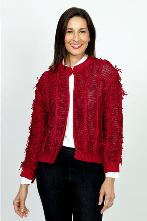 Lolo Luxe Fringe Cardigan in Red.  Crew neck open front cardigan with hook and eye closure at neck line.  Open weave with vertical ribbing.  Fringe detail throughout.  Long sleeves.  Rib trim at neck, hem and cuff.  Relaxed fit._52998207439214