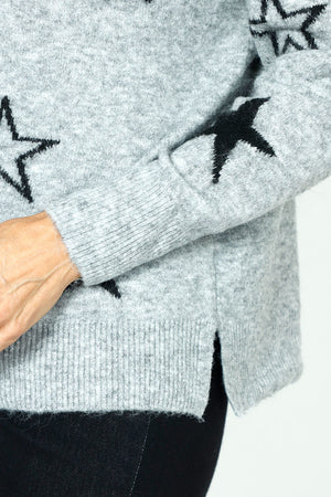 Ten Oh 8 V neck Sweater with Stars in Gray.  Solid and outlines star print on front and sleeves.  Heathered knit.  Long sleeves.  Rib trim at neck, hem and cuff.  Plain back.  Side slits.  Relaxed fit._59402397942126