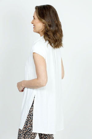 Top Ligne Cap Sleeve Button Down Tunic in White. Pointed collar button down. Cap sleeves. 14" deep side slits. Curved hem. Relaxed fit._35985102831816