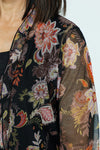 Top Ligne Floral Scrolls Mesh Cardi in Black with multi colored floral print.  Open front mesh cardigan with 3/4 flutter sleeve.  Sewn edges. Relaxed fit._t_52912088318318