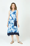 Top Ligne Blue Floral Print Tank Dress in Blue.  Tropical floral print with solid blue flounce at hem.  Diagonal contour seam tank dress.  Scoop neck sleeveless.  Asymmetric hem.  Single solid navy front pocket.  Relaxed fit._t_59702835249518