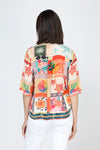 Beau Chemise Tropical Print Blouse.  Bright orange and blue mixed vintage scarf print.  Pointed collar button down with border print at hem.  Elbow length sleeve with folded cuff.  Relaxed fit._t_59783619969390