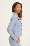 XCVI Tacie Blazer in Spry Blue, a light blue.  Peaked lapel button down cropped blazer in stretch twill.  Contour seams, long sleeves.  2 front diagonal pouch pockets.  Raw edges.  Rolled trim. Relaxed fit._t_59589007737198