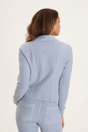 XCVI Tacie Blazer in Spry Blue, a light blue.  Peaked lapel button down cropped blazer in stretch twill.  Contour seams, long sleeves.  2 front diagonal pouch pockets.  Raw edges.  Rolled trim. Relaxed fit._59589007671662