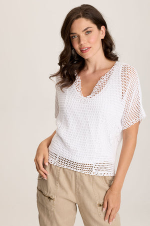 XCV Centre Top in White.  2 piece top with jersey tank and crochet open weave top layer.  Short dolman sleeve.  V neck.  Crochet design at side seams.  Contour seams.  High low hem.  Classic fit._59776865370478