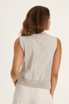 XCVI Grindelle Vest in Whitecap, an off-white.  Convertible collar zip front sleeveless vest.  Distressed Jersey zipper placket.  2 front breast pockets, ribbed insets at banded hem.  Classic fit._t_59594278371694