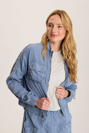 XCVI Burris Jacket in Pacific.  Stand collar zip front jacket with elastic hem.  Brass zipper with toggle.  Long sleeve with elastic cuff and cinch toggle down center sleeve.  Cropped length.  Relaxed fit._59776243564910