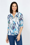 Top Ligne Watercolor Stripe Snap Front Top.  Blue and beige splash print on a white background.  Pointed collar snap front top with pairs of colored snaps.  3/4 sleeve with split hem and lacing detail.  Relaxed fit._t_59772020556142