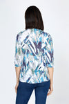 Top Ligne Watercolor Stripe Snap Front Top.  Blue and beige splash print on a white background.  Pointed collar snap front top with pairs of colored snaps.  3/4 sleeve with split hem and lacing detail.  Relaxed fit._t_59772020588910